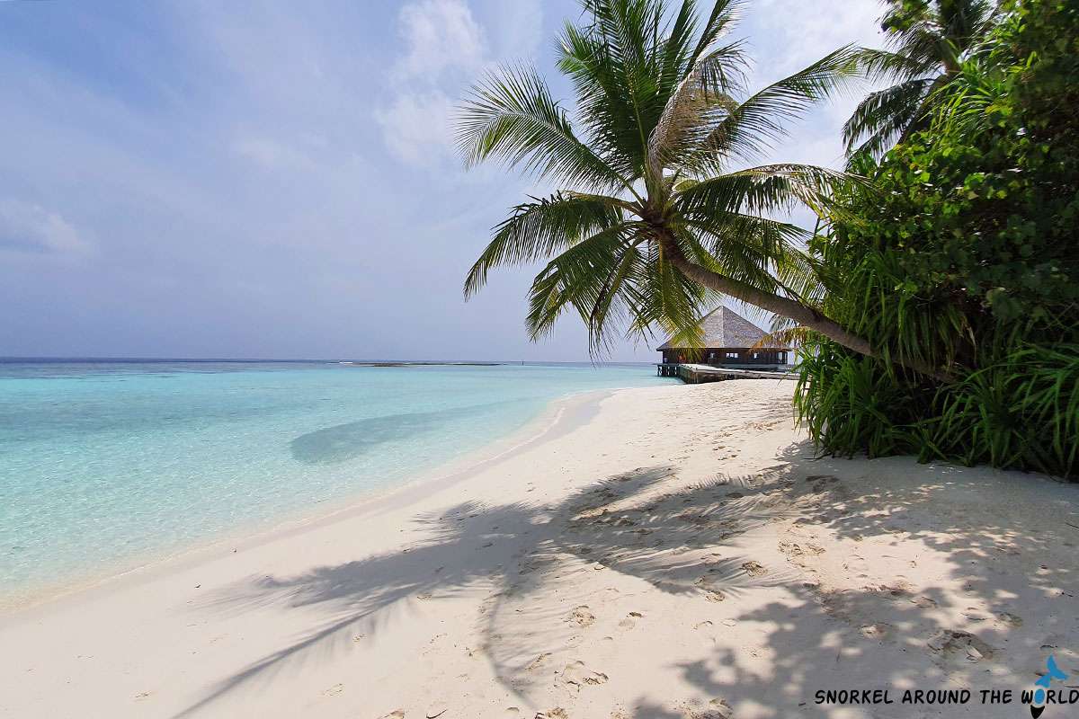 White sandy beach on a resort island in the Maldives