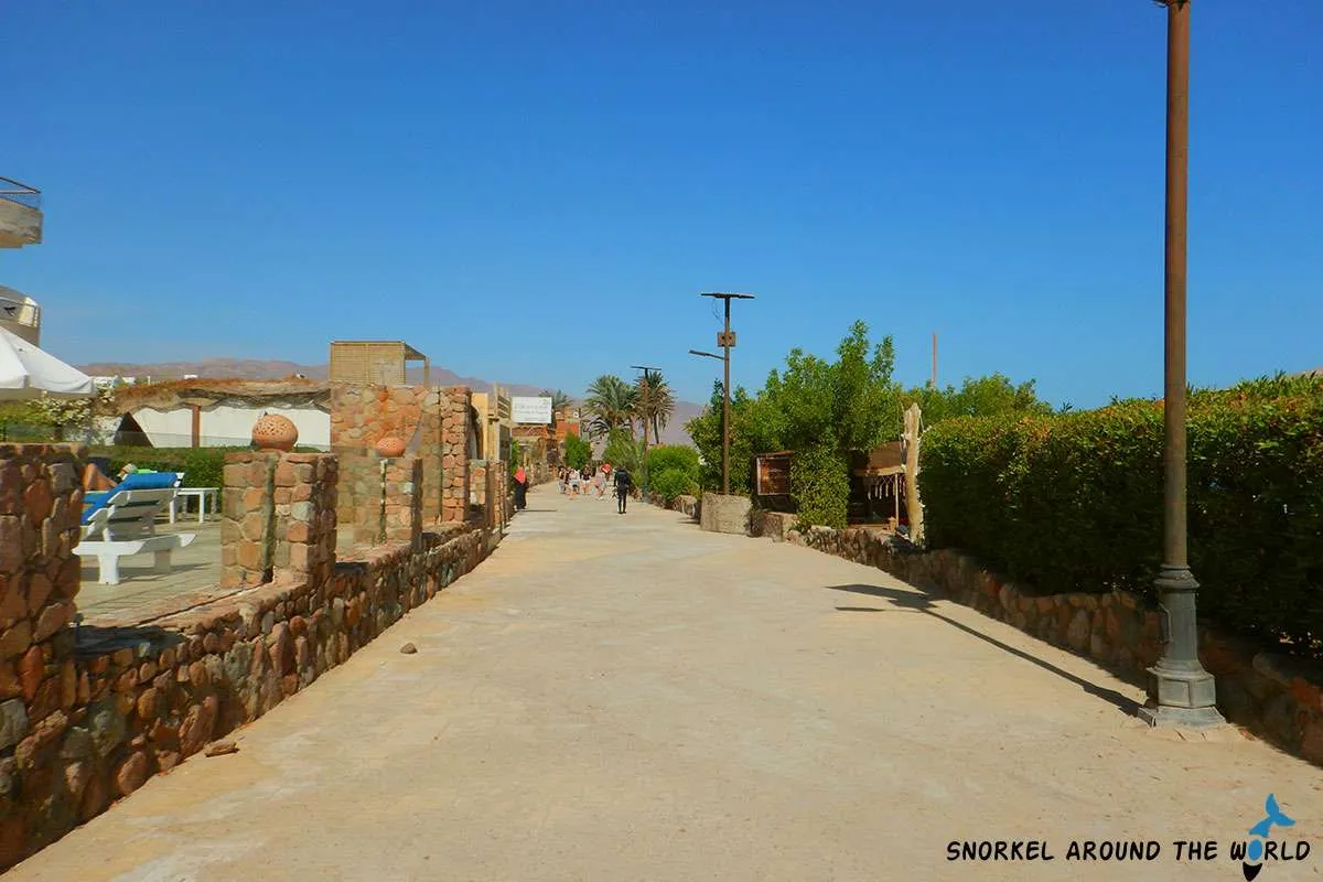 people walking on the promenade in Dahab
